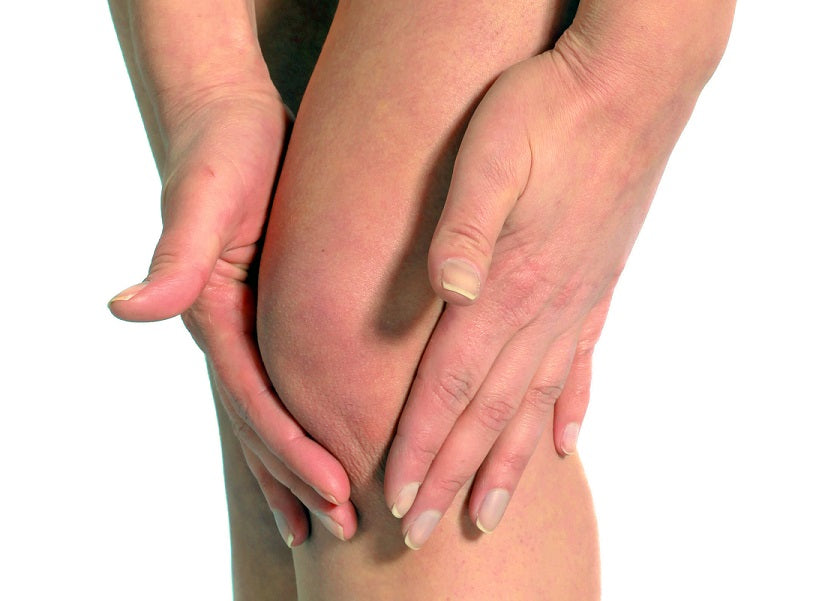 Close-up of a person's legs, representing knee pain and arthritis relief